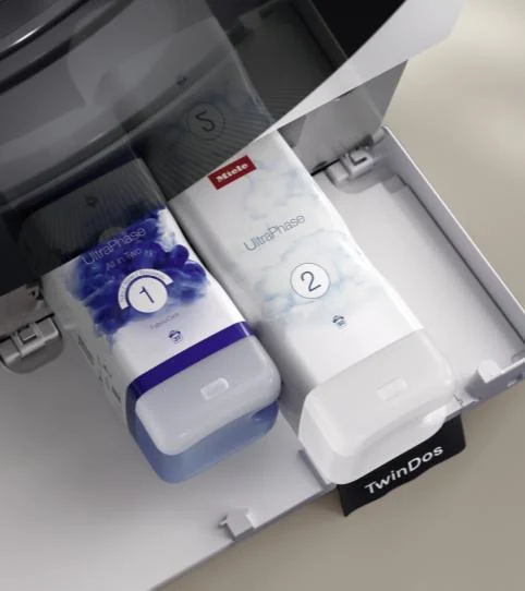 Cassetto TwinDos di una lavatrice Miele con le cartucce UltraPhase 1 e 2
